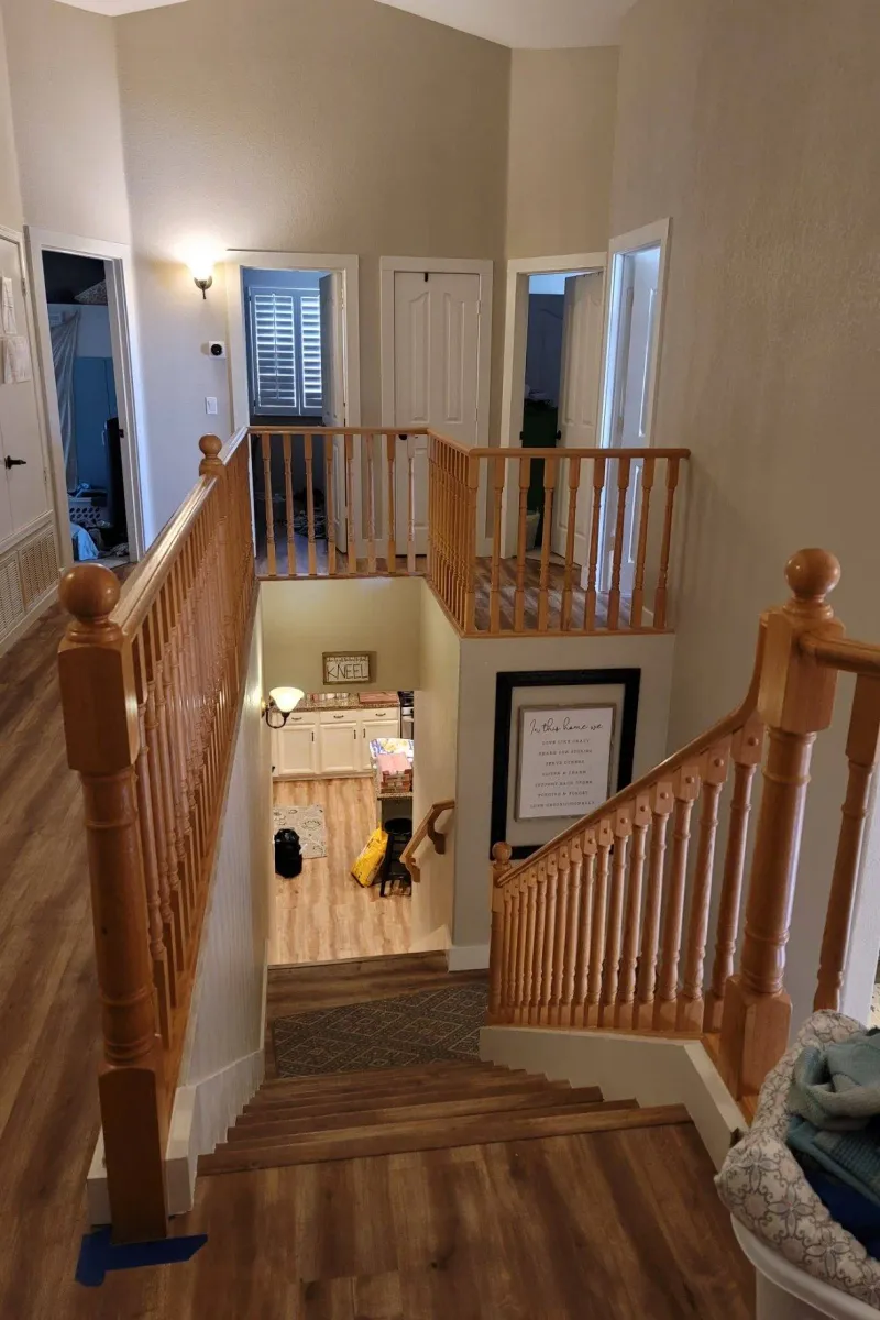 An oak stair railing and spindles, before painting