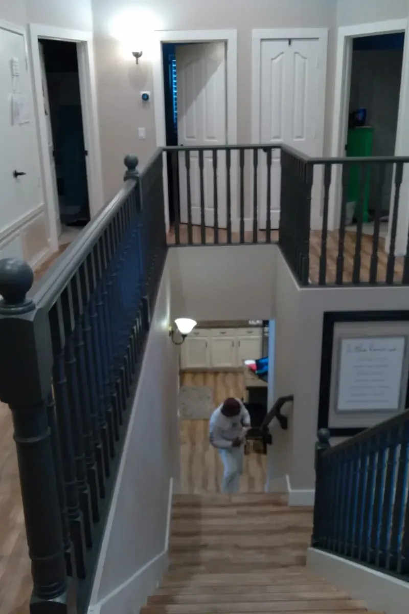 The same stair railing painted black